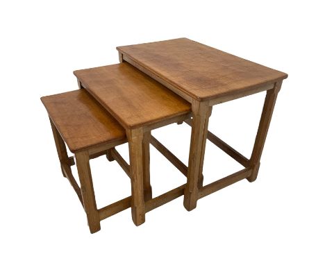 'Mouseman' oak nest of three tables, rectangular adzed tops, each table carved with mouse signature, by Robert Thompson of Ki