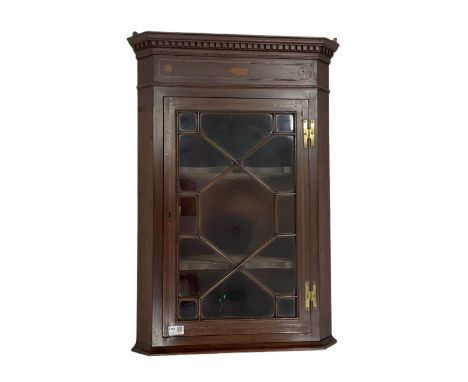 19th century inlaid mahogany wall hanging corner cabinet, the dental cornice over glazed door of astragal design