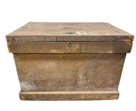 Hardwood trunk, the hinged lifting lid opening to reveal storage space, raised on a plinth base 