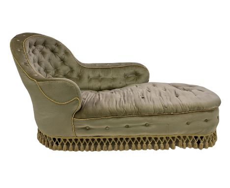 Victorian chaise longue, upholstered in green buttoned back fabric, raised on turned supports, terminating in ceramic castors