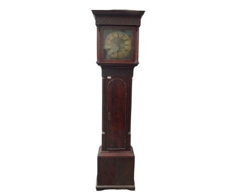 A late 18th century mahogany longcase with an associated dial and later movement, flat topped hood with a dentil cornice and 