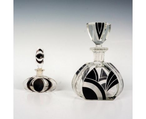 A lovely set decorated with clean geometric pattern on black enamel. Tallest measures: 4.5"L x 3"W x 6.5"H. Smallest measures