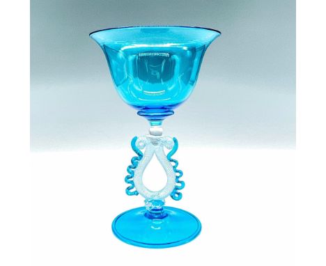 The Tipetto wine glass is a gorgeous and unique piece of art, handcrafted with stunning blue glass and a dazzling white spira