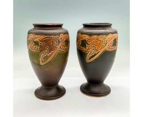 Two rich brown vases with grapes and leaves motif in low-relief. Roseville Rosecraft backstamp. Issued: Circa 1925Dimensions: