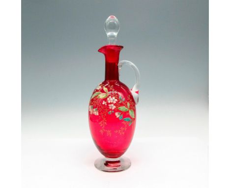 Glass decorated with white enamel flowers, green leaves and gilding with applied clear glass handle and base. Clear teardrop 