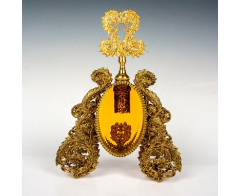 Exquisitely designed with beveled glass body and scroll interior finial. Stopper is beautifully gilded and patterned. Dimensi