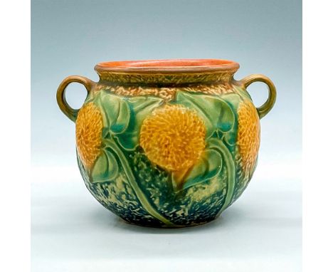 Vintage pottery planter pot in a rich dark orange glaze, adorned with charming sunflower decorations. Issued: c. 1930sDimensi