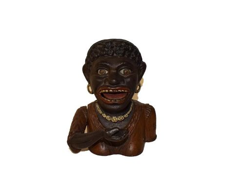 A painted cast Dinah mechanical money box  These items are listed on the basis they are illustrative of by a gone culture in 