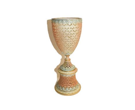 Grainger &amp; Co Worcester pierced pedestal vase, blush ground with green moulded leaf borders, printed mark, 27.5cm 