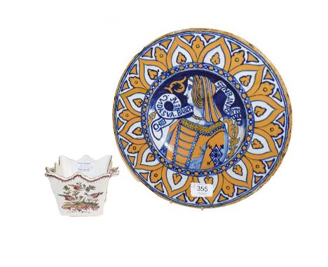 A Maiolica Bella Donna dish in 16th century Deruta style, painted in blue and ochre with a bust length portrait of a lady and