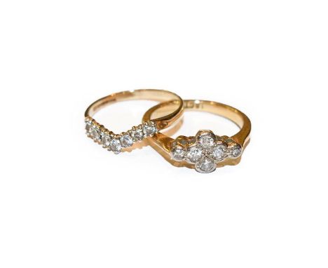 A 9 carat gold diamond wishbone ring, the round brilliant cut diamonds, in white claw settings, to a yellow plain polished sh