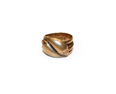 An 18 carat gold snake ring, finger size N1/2 .  Gross weight 12.8 grams. 