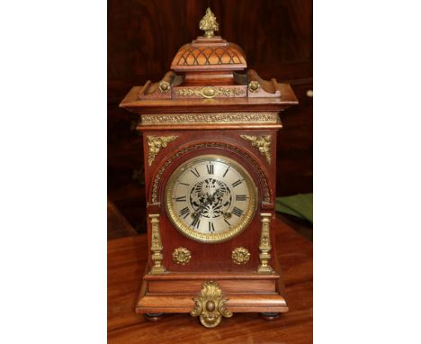 A German gilt metal mounted striking mantle clock, circa. 1900, 44cm high, movement striking on a gong, back plate stamped Le