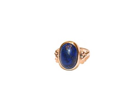 A 9 carat gold lapis lazuli ring, finger size N1/2.  Gross weight 5.7 grams. 