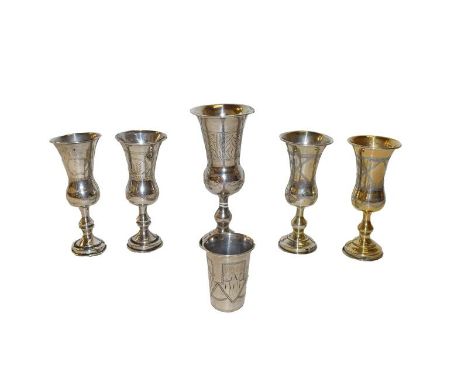 Five various Edward VII or George V silver or silver gilt Kiddush cups, each of typical form, comprising a pair by Jacob Roze
