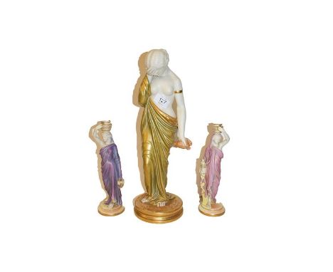 A Royal Worcester figure of a Grecian maiden, printed puce mark, 41cm together with a smaller pair of Royal Worcester figures