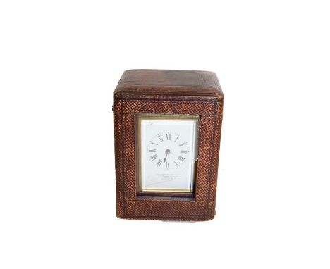 A brass striking and repeating carriage clock, signed 'Goldsmiths Company, 112 Regent Street and travelling case', circa 1890