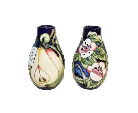 A pair of modern Moorcroft Cawthorne pattern vases, designed by Emma Bossons, 4/150 and 10/150, 13.5cm