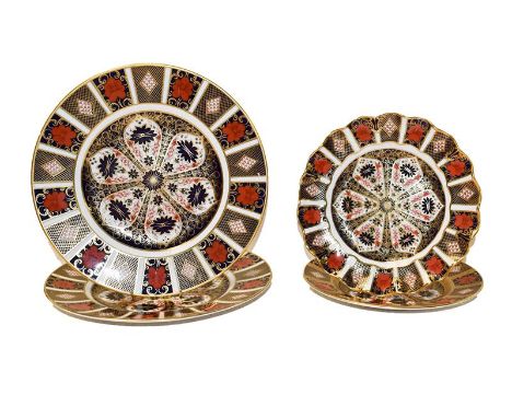 A pair of Royal Crown Derby circular plates, 27cm diameter together with another smaller circular plate 21.75cm diameter and 