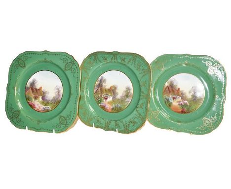 Three Royal Worcester plates with gilded and green ground edge the centre painted with cottage garden scenes, indistinctly si