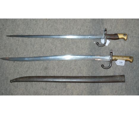 A French bayonet, the blade inscribed, the guard and metal scabbard numbered AC 47793 and another, the blade inscribed (2)&nb