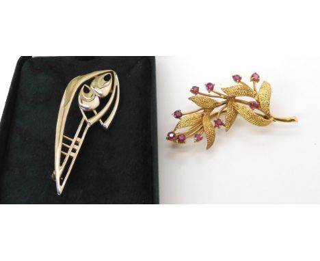 A 9ct gold and ruby flower brooch weight 6.2gms, together with a silver Ola Gorie brooch Condition Report:Available upon requ