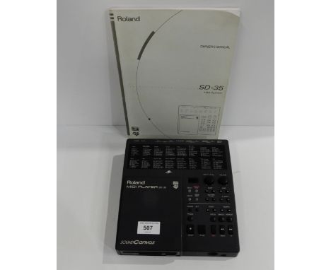 A Roland SD-35 midi player with owner's manual Condition Report:Available upon request