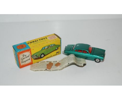 A Corgi No. 238 Jaguar Mk X comprising of metallic sea green body with red interior and spun hubs, in the original box, with 
