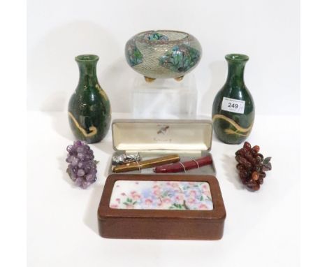 A plique du jour bowl, a pair of Japanese green glazed vases with dragons, two hardstone grape groups, an enamel topped box e