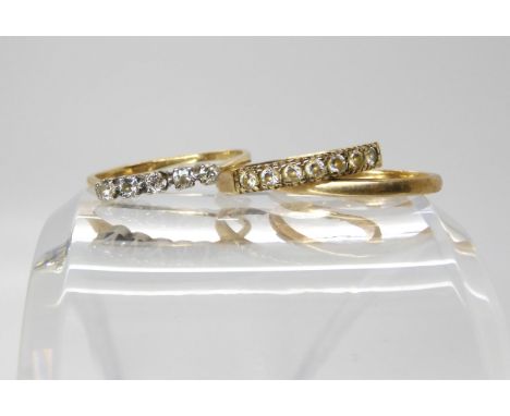 A 9ct five stone diamond ring, set with estimated approx 0.25cts of brilliant cuts, size S, a 9ct clear gem set ring, size R,