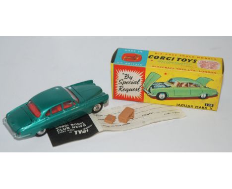 A Corgi No. 238 Jaguar Mk X comprising of metallic sea green body with red interior and spun hubs, in the original box, with 