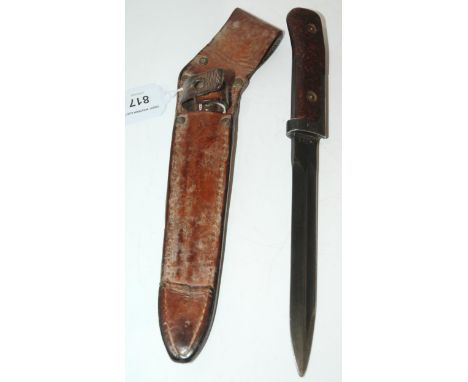 A bayonet/fighting knife in leather scabbard 29 cm o/all length Condition Report:Available upon request