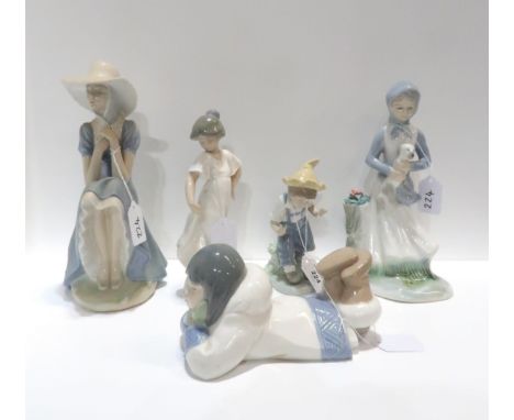 A Nao figure of a lady in a hat, a girl lying down, a girl in a white dress, a boy, and another figure (5) Condition Report:A