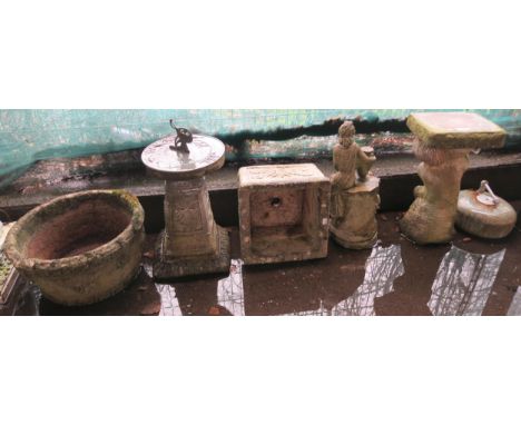 A lot of two reconstituted stone garden planters, two garden figures, sundial and a curling stone (6) Condition Report:Availa