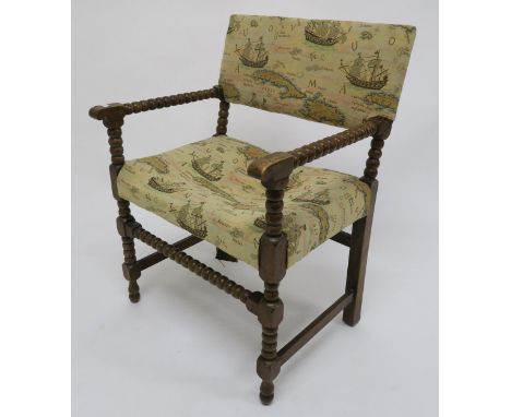 A Victorian beech framed bobbin turned armchair with tapestry upholstery Condition Report:Available upon request