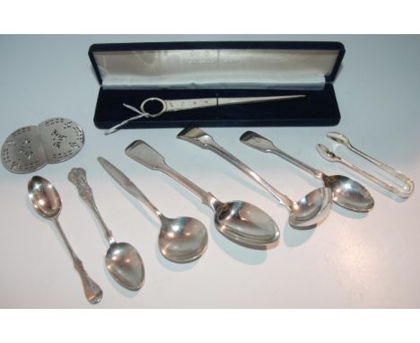 A cased sterling silver meat skewer, 17cm long, a silver dessert spoon, Exeter 1851, a white-metal sauce ladle, a silver buck