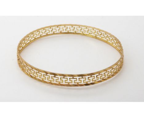 A Greek key pattern bangle stamped '585' inner diameter 6.5cm, weight 6.5gms Condition Report:Available upon request
