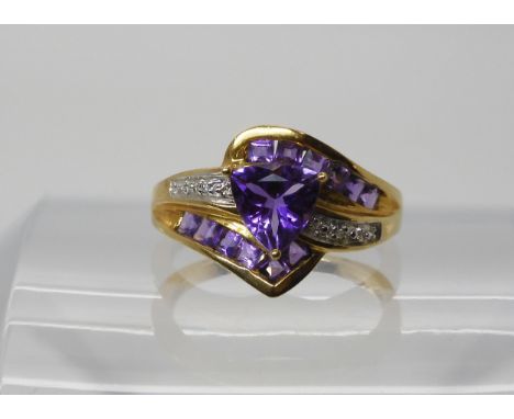 A 9ct gold amethyst and diamond accent dress ring, size N1/2, weight 3.2gms Condition Report:Available upon request