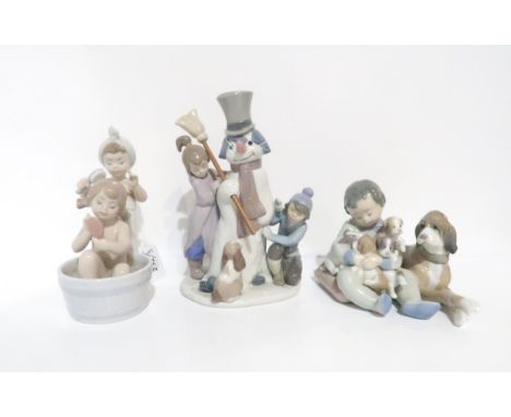 Lladro figure Bathing Beauties 6457, The Snowman 5713, Playmates 5456 Condition Report:Playmates front paws are both broken