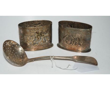 A silver sifter ladle, Dublin marks, 18cm long and a pair of Danish embossed white-metal tooth pick holders, 5.3cm high Condi