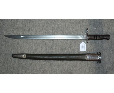 An American bayonet by Remington, the blade stamped, in metal scabbard Condition Report:Available upon request