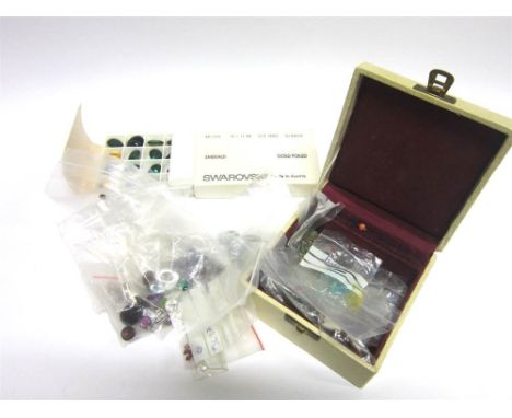 A QUANTITY OF MIXED LOOSE STONES including moonstones; garnets; amethyst, turquoise and a box of Swarovski 'emerald' pastes