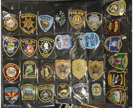FOLDER OF 122 POLICE FORCE CLOTH PATCH BADGES USA 