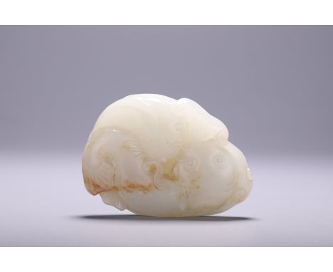 A Chinese russet jade 'Twin Fish' carving, L 7,1 - W 5 cm