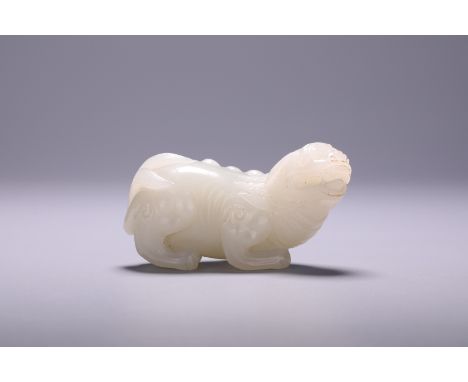 A Chinese jade 'Mythical Beast' carving, L 6,5 - H 3,5 cm
