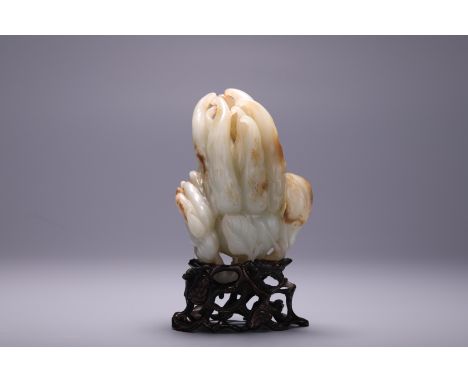 A Chinese russet jade carving of Buddha's hand citrus, H 11 cm
