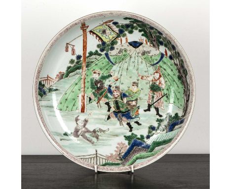 Famille verte chargerChinese, Kangxi periodpainted to the centre depicting Pangu with his axe, the base with artemisia mark, 