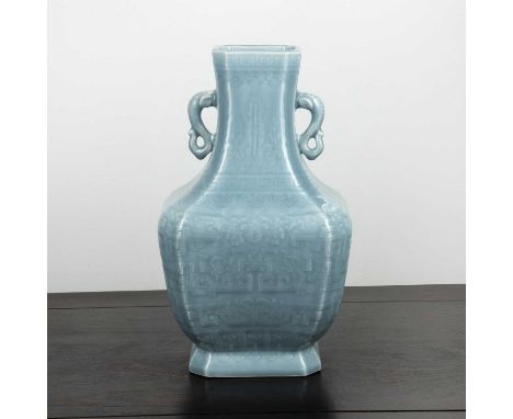 Pale blue glazed vaseChinese, 19th Centurydecorated with slightly raised decoration depicting ruyi heads and various symbols,