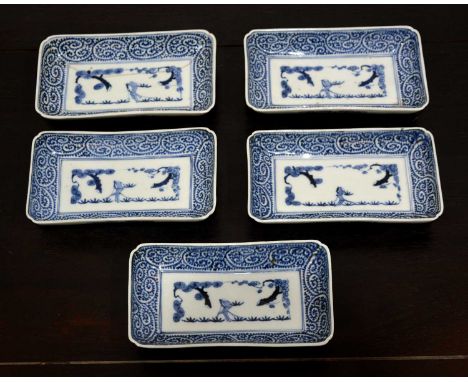 Five Arita blue and white porcelain rectangular shallow dishesJapanese, 17th/18th Centurywith indented corners, interiors dec