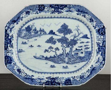 Large blue and white porcelain export meat plateChinese, early 19th Centurypainted with a river scene, 42cm x 34cm Some fritt